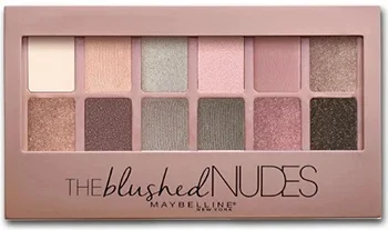 A close-up view of the Maybelline The Blushed Nudes Eyeshadow Palette, featuring a variety of twelve shades in soft pink, mauve, and neutral tones arranged in an elegant rectangular case with a transparent window.