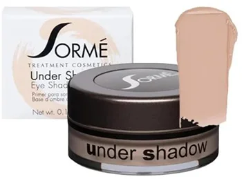 A compact container of Sorme Treatment Cosmetics Under Shadow Primer with the product name prominently displayed. Next to it there is a swatch of the neutralizing eyelid primer in a peachy tone.